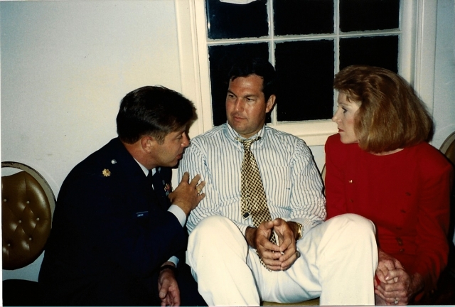 Robert Donovan trying to get Randy Blankenship to enlist while his wife Karen watches on in disbelief